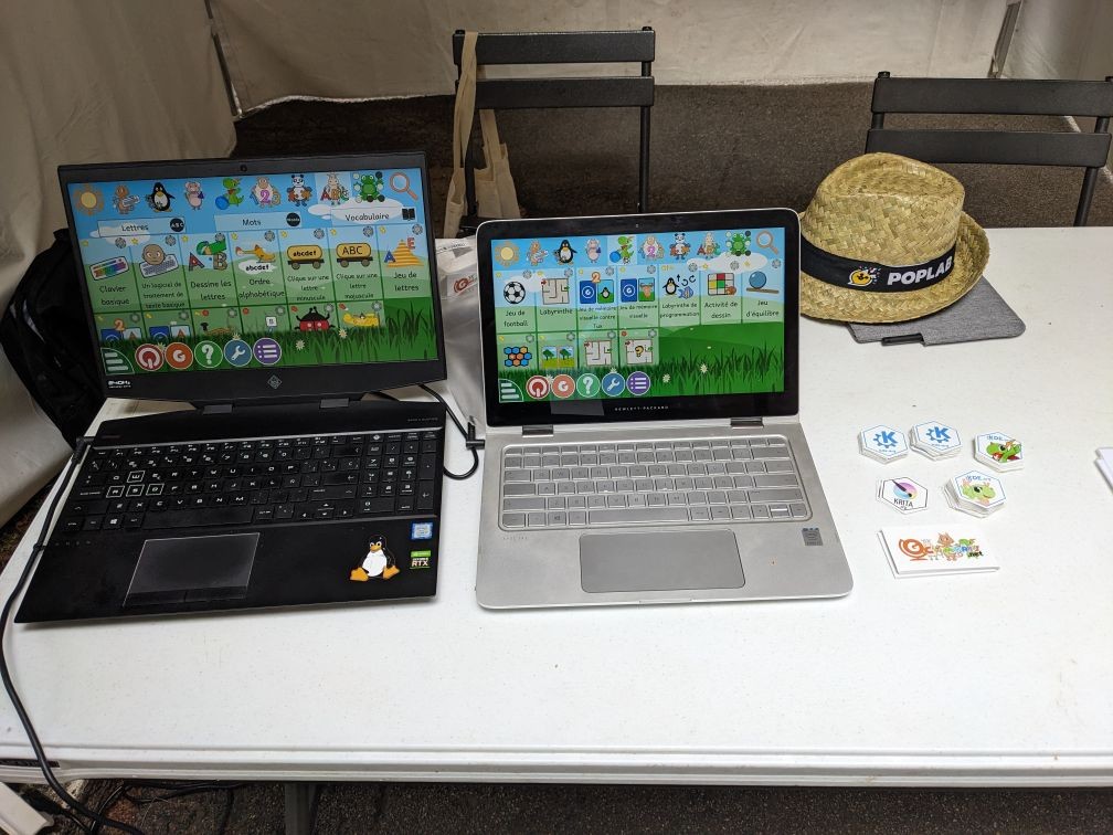 Picture of the booth with Laptops and stickers