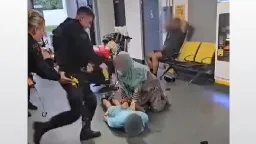 Police officer suspended after footage shows suspect being stamped on the head at Manchester Airport